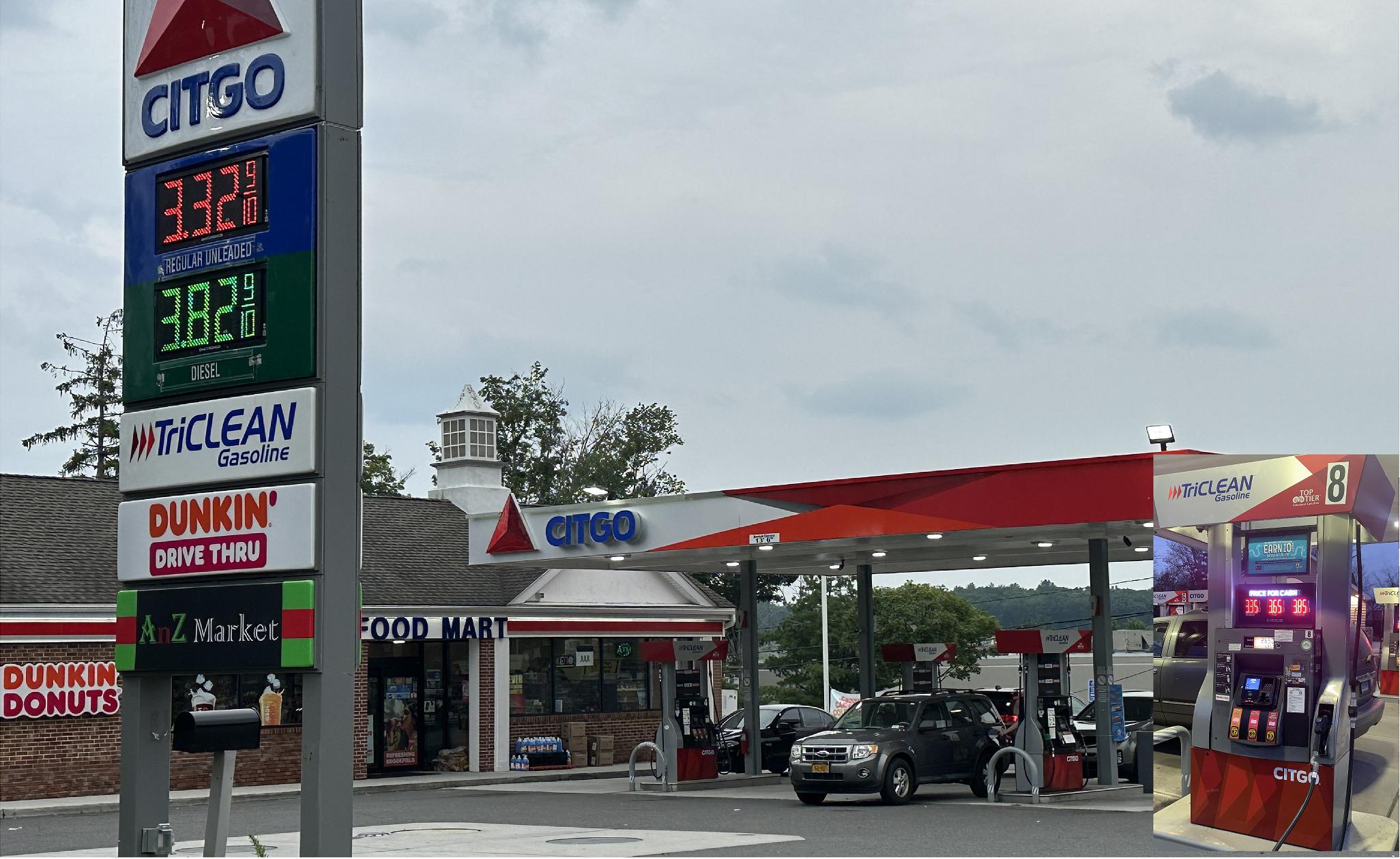 LED Gas Station Pump Toppers.LED petrol pump toppers displaying fuel prices and promotional ads at a modern fuel station.