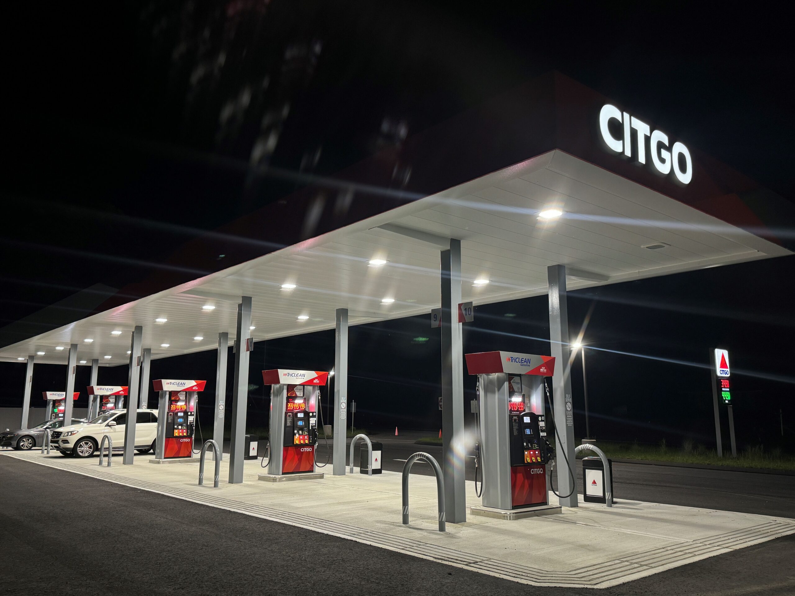 GAS Stations LED Digital Price Signs .GAS Stations- LED Digital Price Signs.LED Gas Station Pump Toppers.LED petrol pump toppers displaying fuel prices and promotional ads at a modern fuel station.led signs