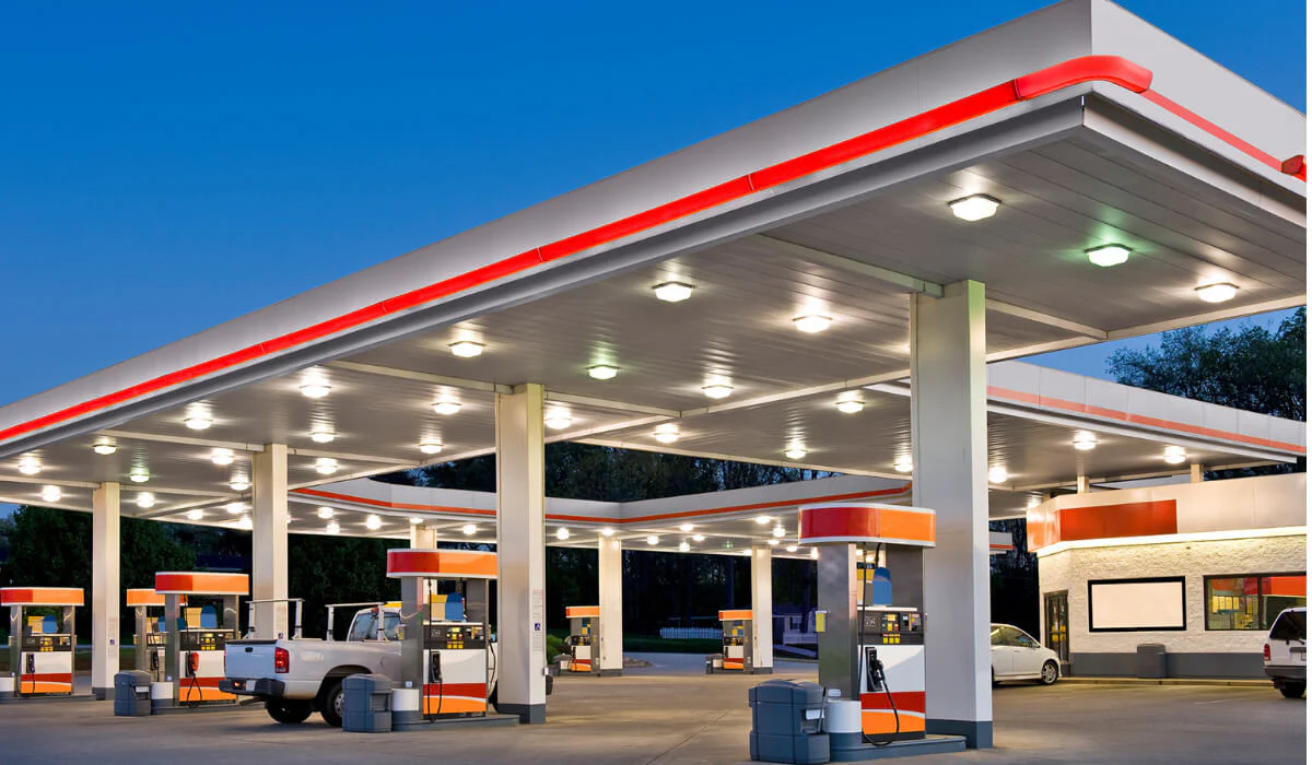 Gas station Canopy led deck lights .Led digital signs.led canopy lights.Gas Stations Branding and Imaging.LED Gas Station Pump Toppers.LED petrol pump toppers displaying fuel prices and promotional ads at a modern fuel station.led signs