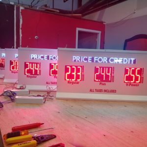 GAS Stations LED Digital Price Signs .GAS Stations- LED Digital Price Signs.LED Gas Station Pump Toppers.LED petrol pump toppers displaying fuel prices and promotional ads at a modern fuel station.led signs