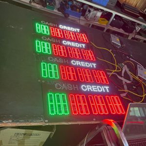 GAS Stations LED Digital Price Signs .GAS Stations- LED Digital Price Signs.LED Gas Station Pump Toppers.LED petrol pump toppers displaying fuel prices and promotional ads at a modern fuel station.