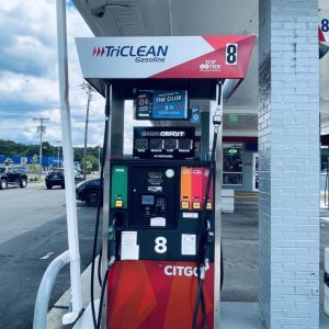 LED Gas Station Pump Toppers.LED Gas Station Pump Toppers.LED petrol pump toppers displaying fuel prices and promotional ads at a modern fuel station.