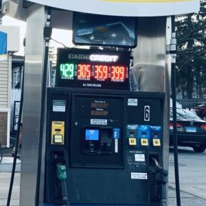 LED Gas Station Pump Toppers.LED Gas Station Pump Toppers.LED petrol pump toppers displaying fuel prices and promotional ads at a modern fuel station.